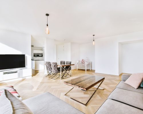 spacious-living-room-in-minimal-style-in-apartment-7FC48S4